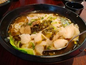 Noodle Soup with Pickled Greens and White Fish Slices
